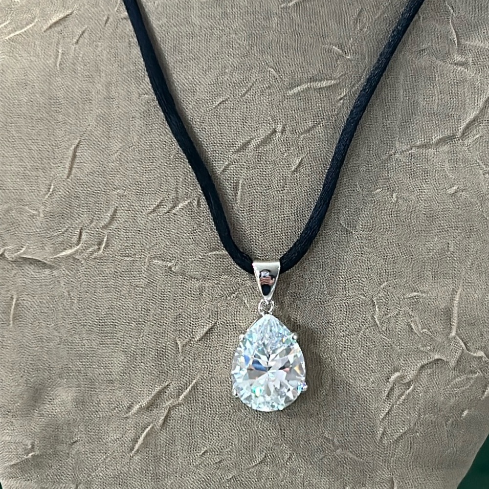 Sterling Silver Tear-Drop Shape Cubic Zirconia Pendant on Black String Necklace